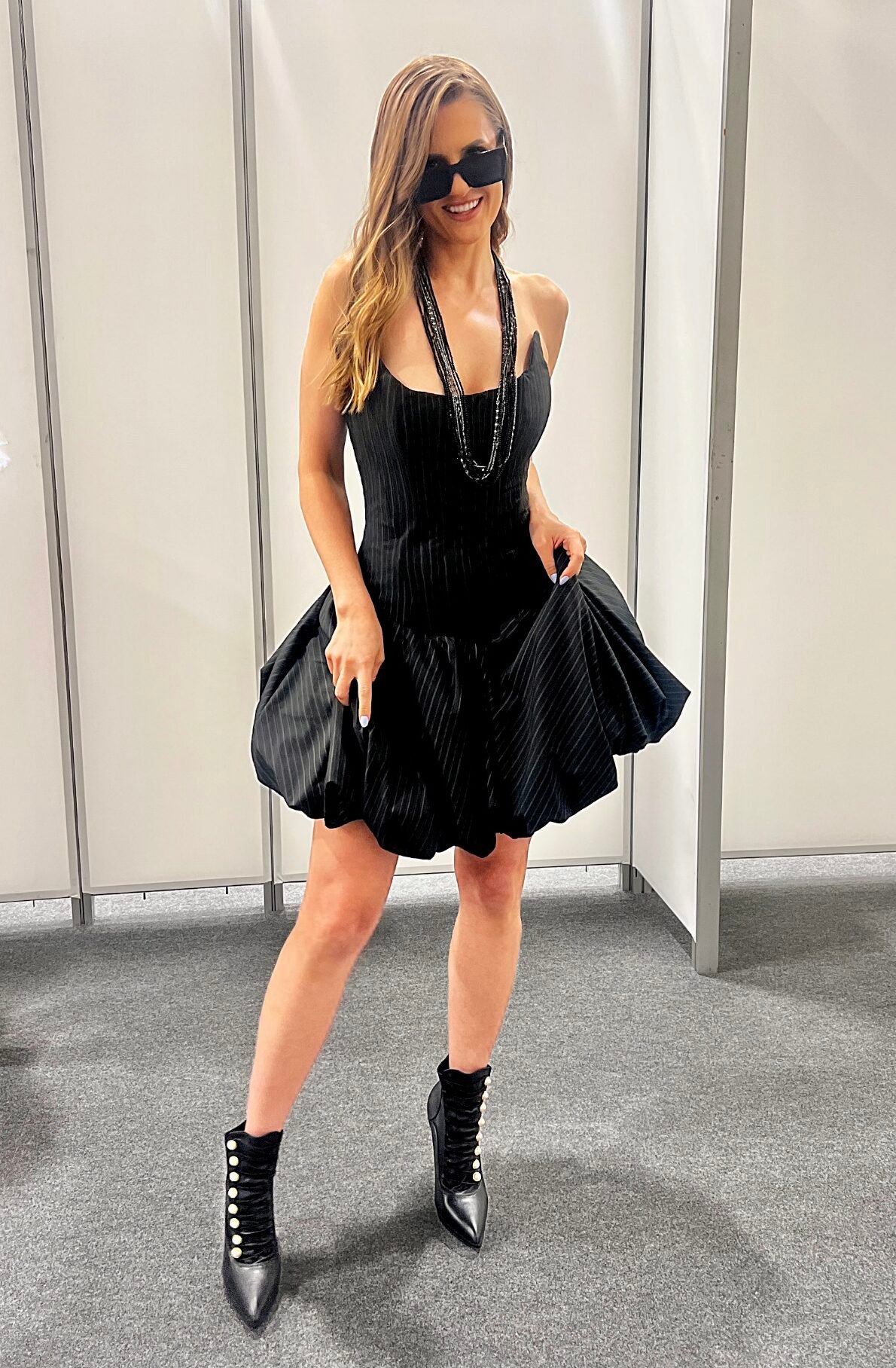 Runway model presenting upcoming Nordstrom fashion trends at MAGIC Tradeshow wearing designer apparel
